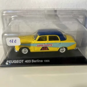 Peugeot 403 berline jaune et toit bleu de 1966 (publicité SUPER COCOTTE)