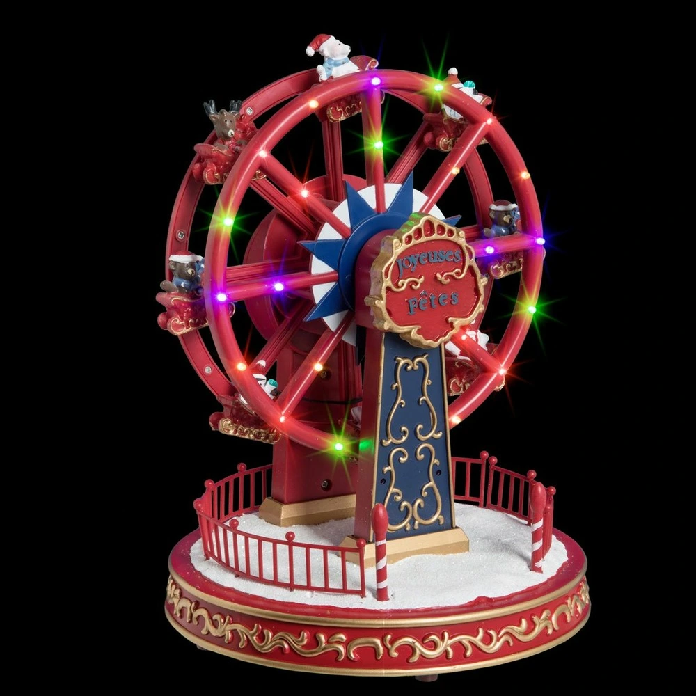 Village de noël lumineux, musical et animé grande roue à la fête foraine par Akrapovič