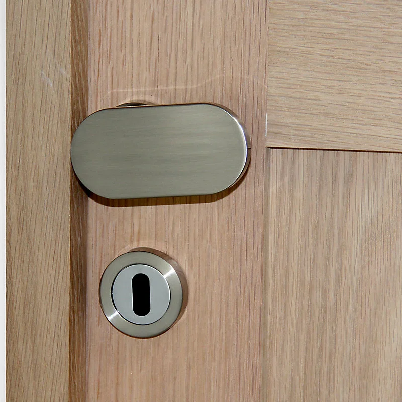 Ensemble poignée de porte sur rosace ovale à visser boucicaut Chrisligne nickel mat gris Ø50mm
