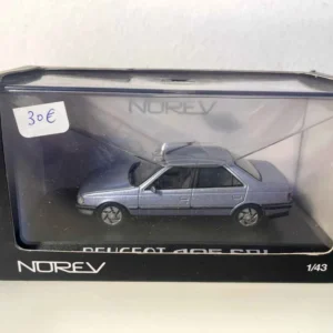 Peugeot 405 berline SRI bleue (Norev) avec top case