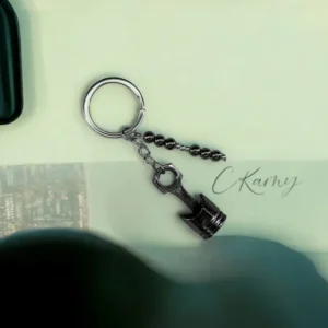 Porte clé personnalisé, Piston mécanique de voiture. Modèle : Noir Argenté. C - Kamy