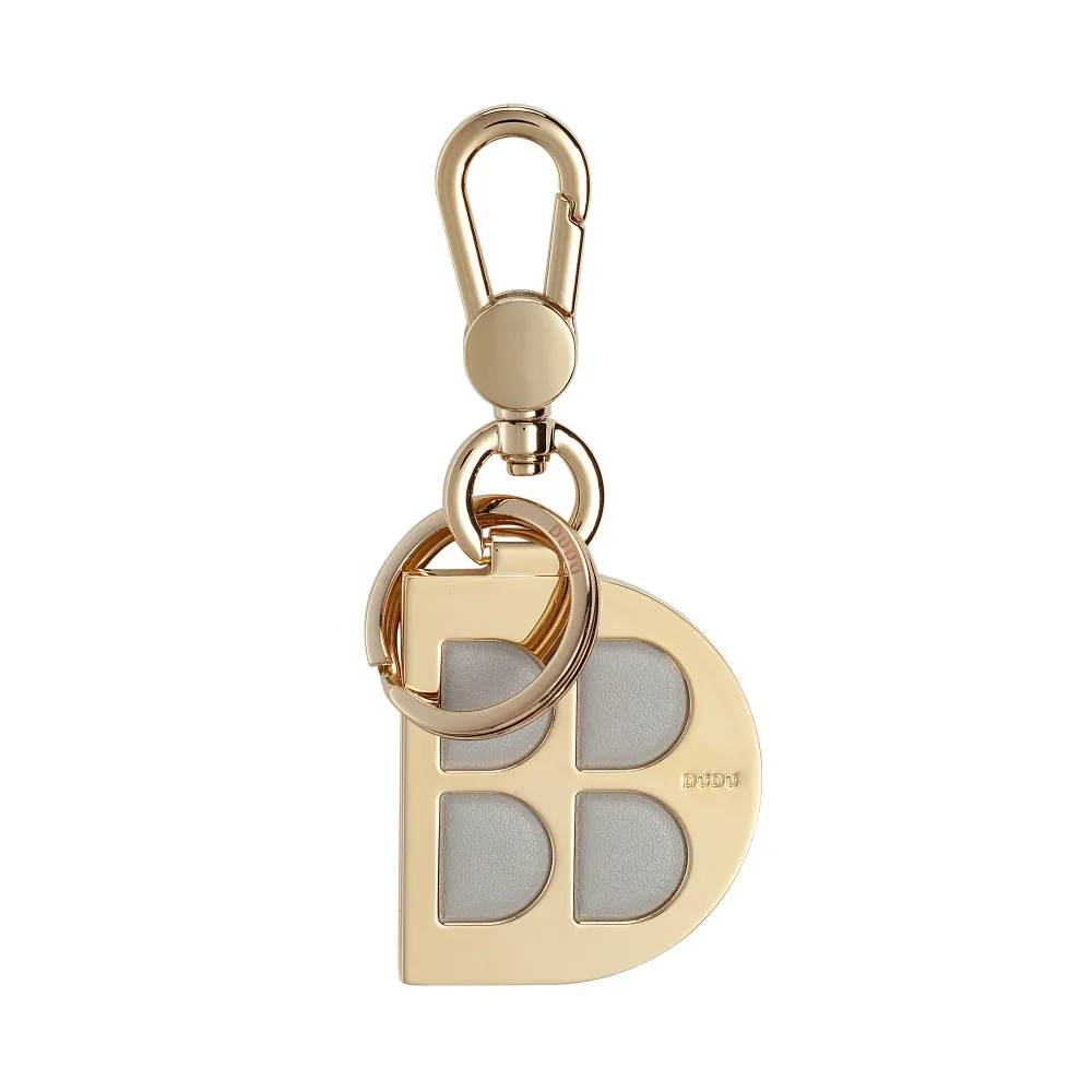 DUDU Porte-clés en métal en forme de D avec inserts en cuir véritable, porte-clés doré avec mousqueton et anneau, porte-cl...